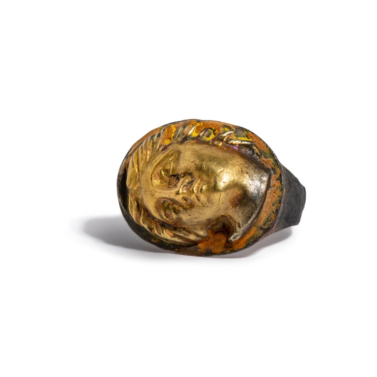 A Greek Gilt-Silver Finger Ring with a Female Portrait Head in High Relief