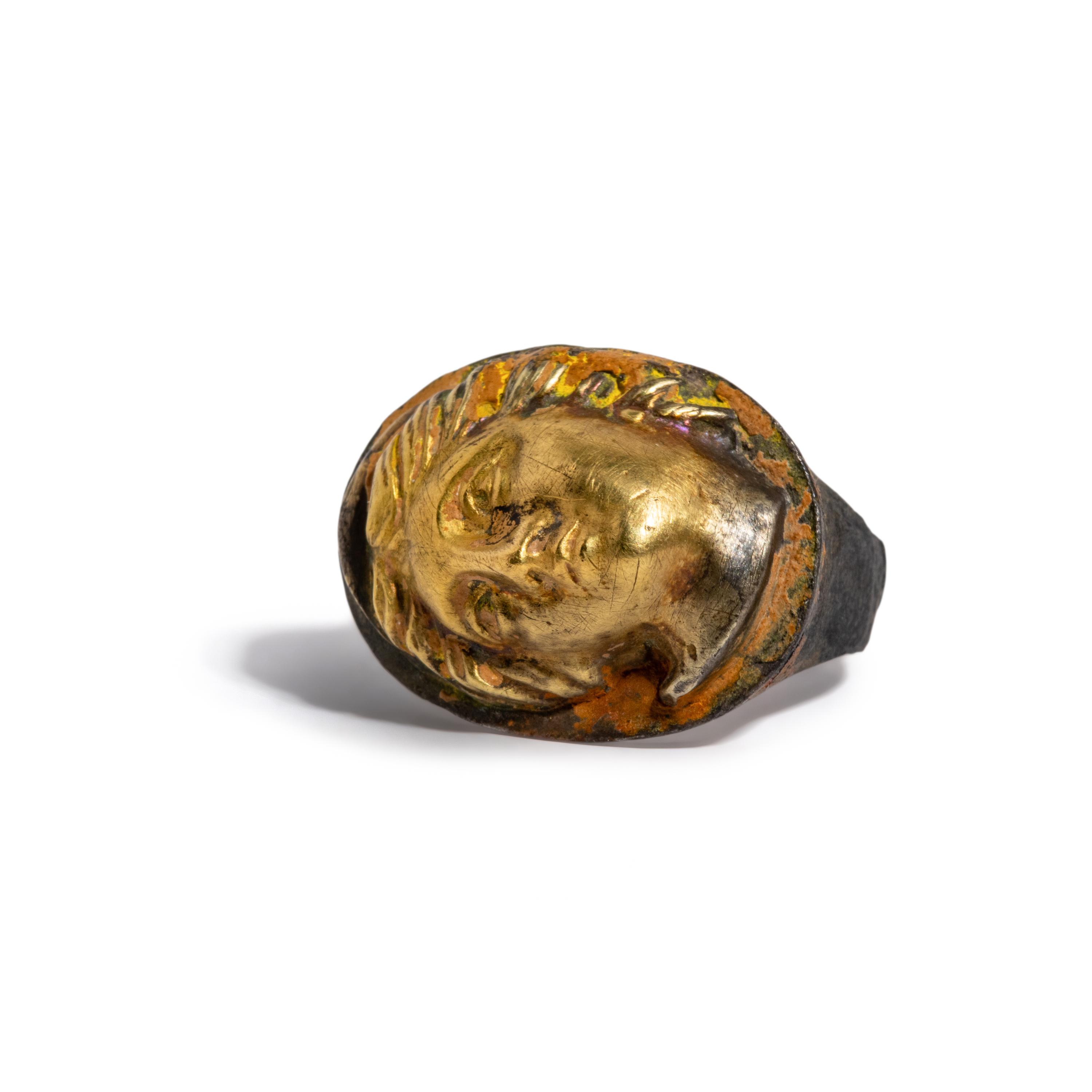 A Greek Gilt-Silver Finger Ring with a Female Portrait Head in High Relief