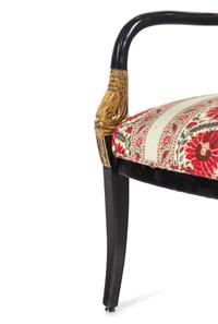 A Pair of Louis Philippe Style Parcel Gilt and Ebonized Armchairs
