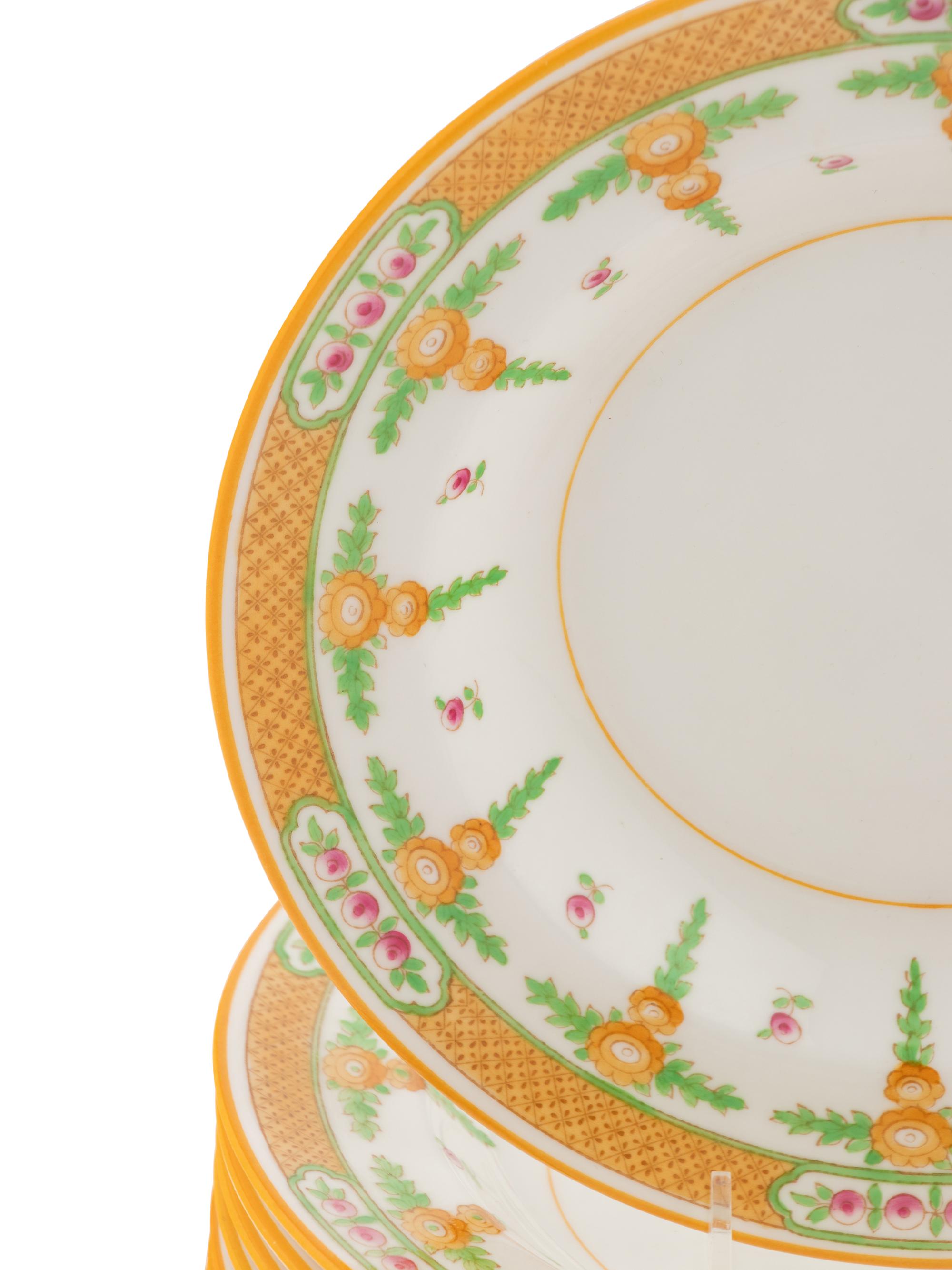 A Set of Twelve Royal Doulton Soup Plates