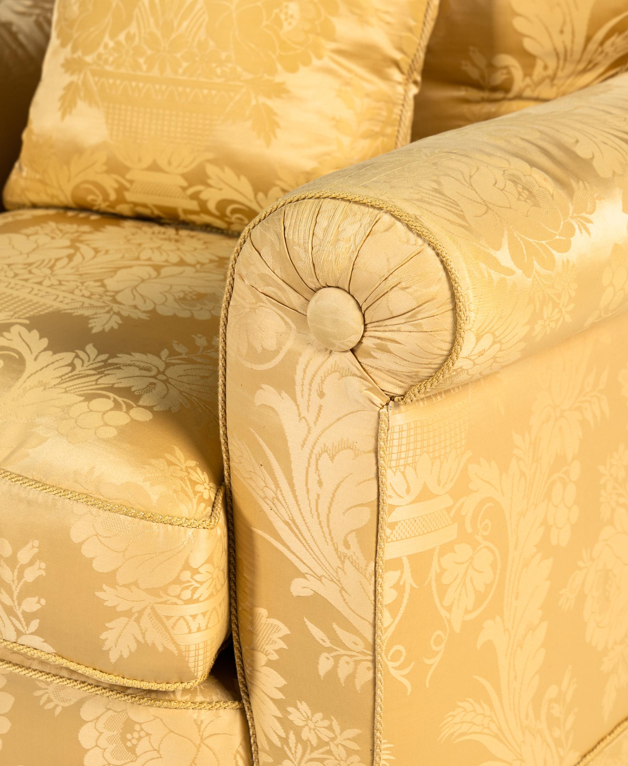 A Pair of Damask-Upholstered Easy Chairs