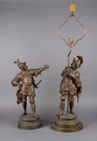 A Pair of Cast Metal Figures, Height 22 1/2 inches.