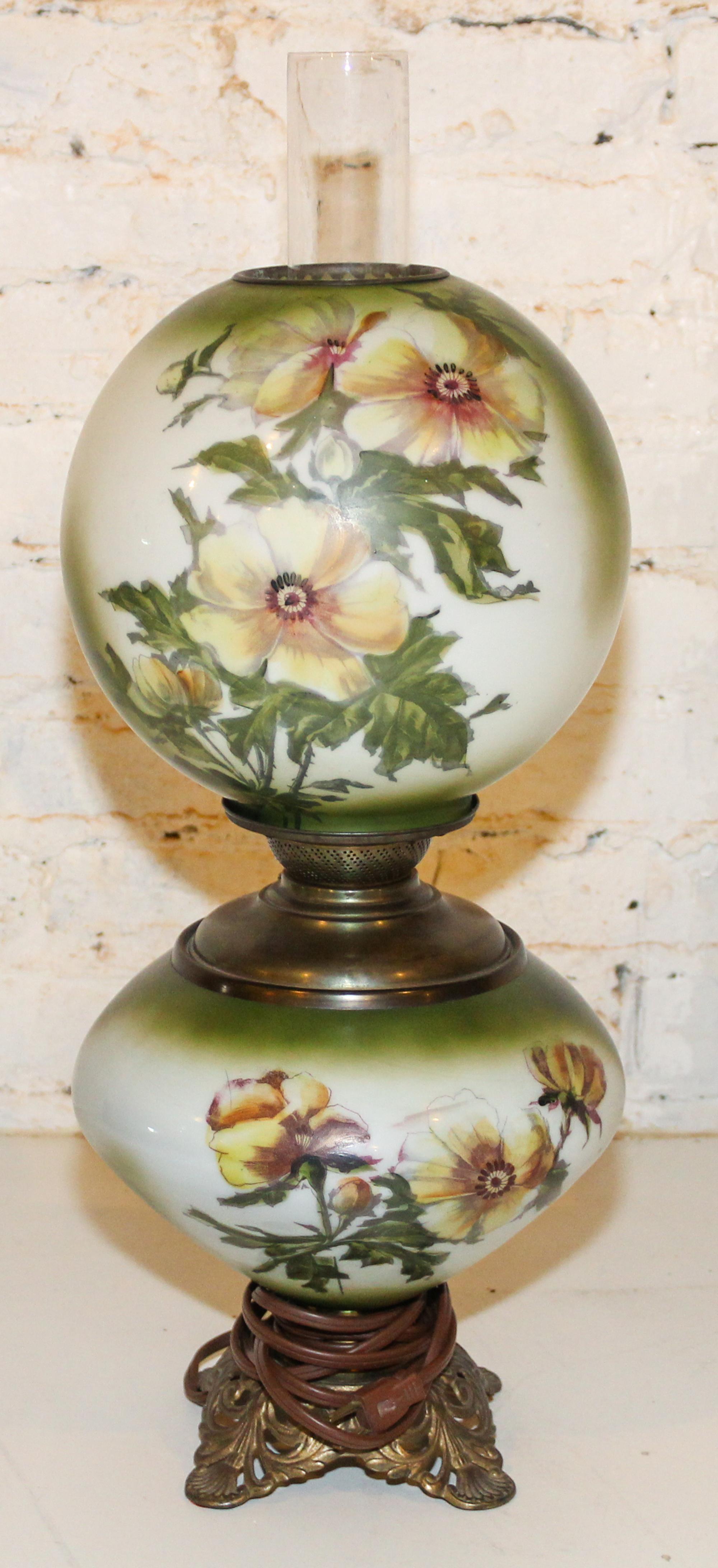 An American Glass Fluid Lamp Height overall 23 3/4 inches. — 19TH/20TH CENTURY