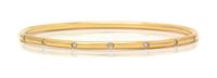 An 18 Karat Yellow Gold and Diamond Bangle Bracelet, Tiffany & Co., 11.80 dwts.