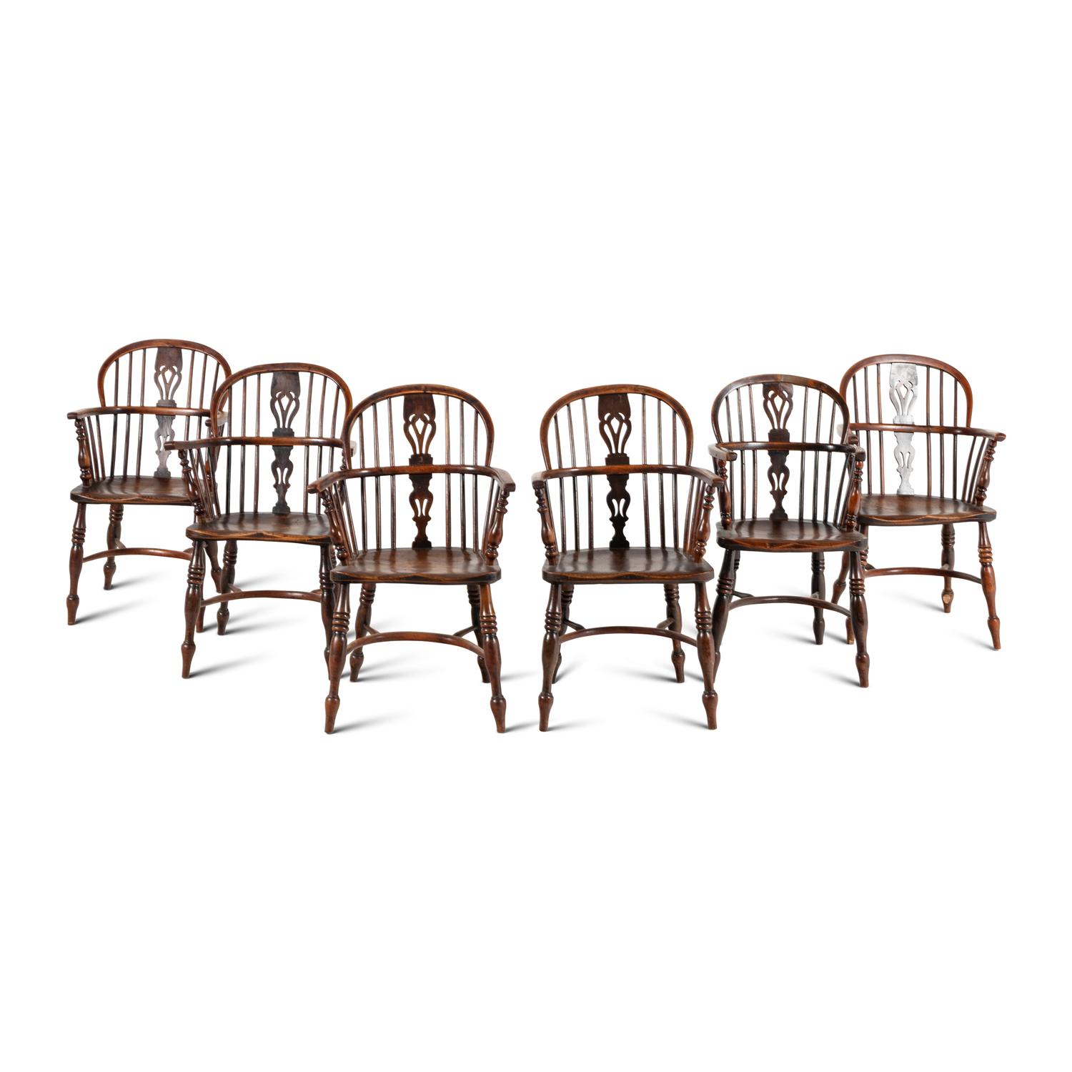 A Set of Six Yew and Elm Windsor Chairs