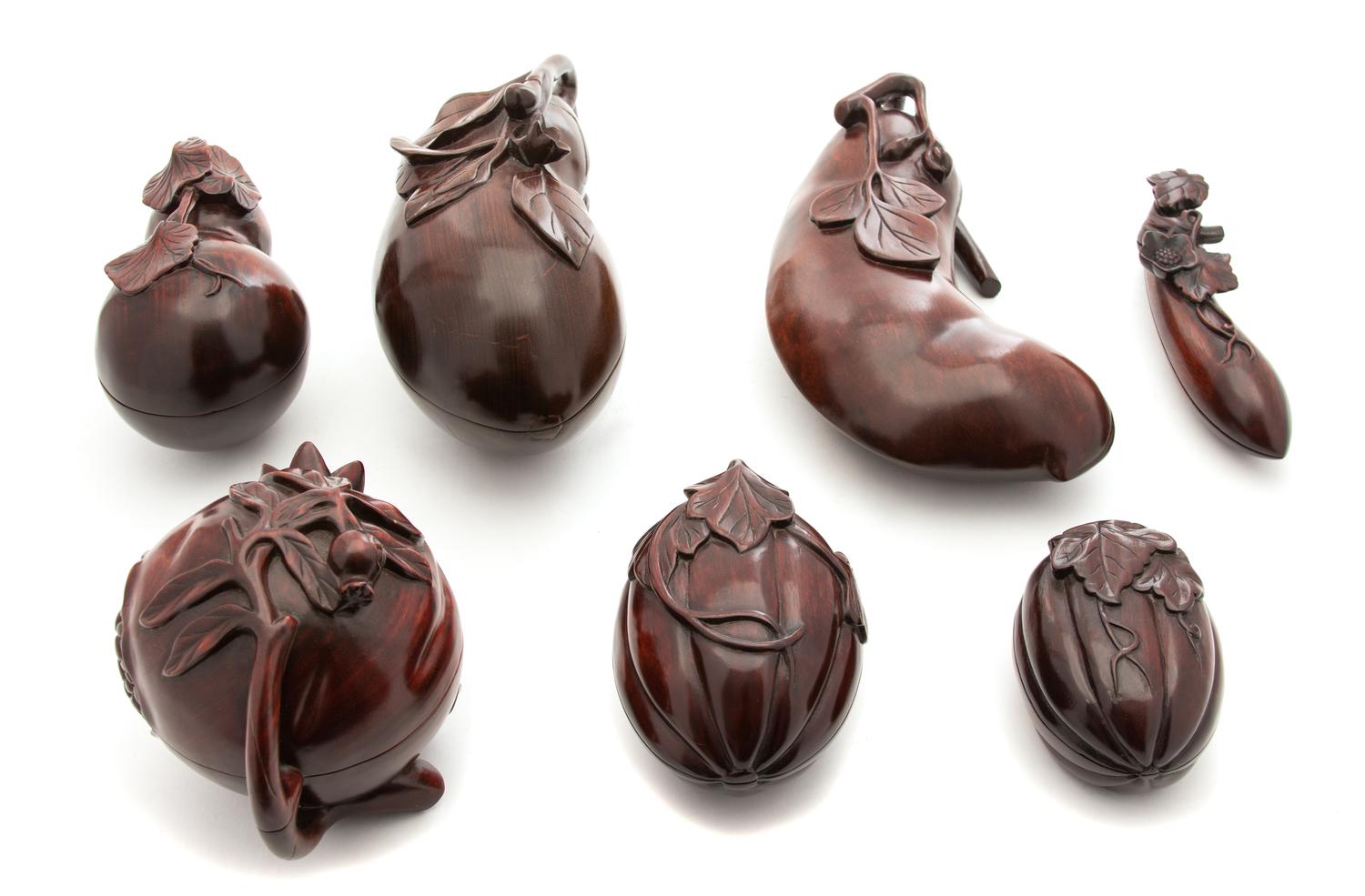 A Collection of Seven Japanese Carved Hardwood Vegetable-form Boxes Largest, Length 9 1/4 inches. — 20TH CENTURY