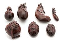 A Collection of Seven Japanese Carved Hardwood Vegetable-form Boxes Largest, Length 9 1/4 inches. — 20TH CENTURY
