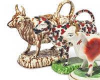 A Group of Three Staffordshire Cow-Form Creamers