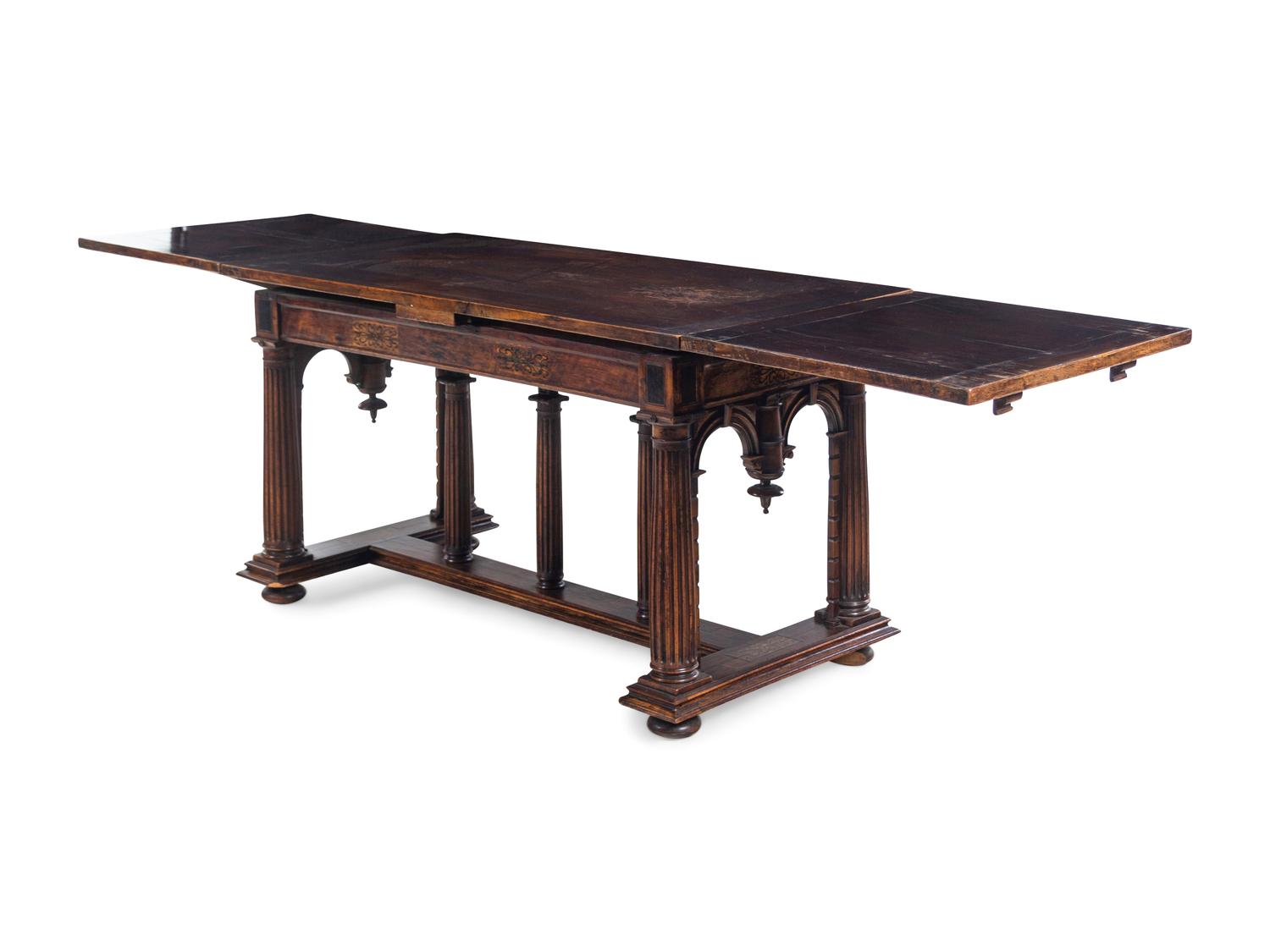 An Italian Walnut Extension Refectory Table