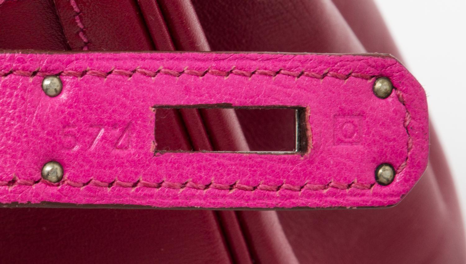 An Hermes Rubis and Rose Tyrien Candy Tadelakt and Chevre Retorne 28cm Kelly Handbag, 11" x 8.5" x 4".