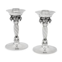 A Pair of Georg Jensen Silver Grape Candlesticks