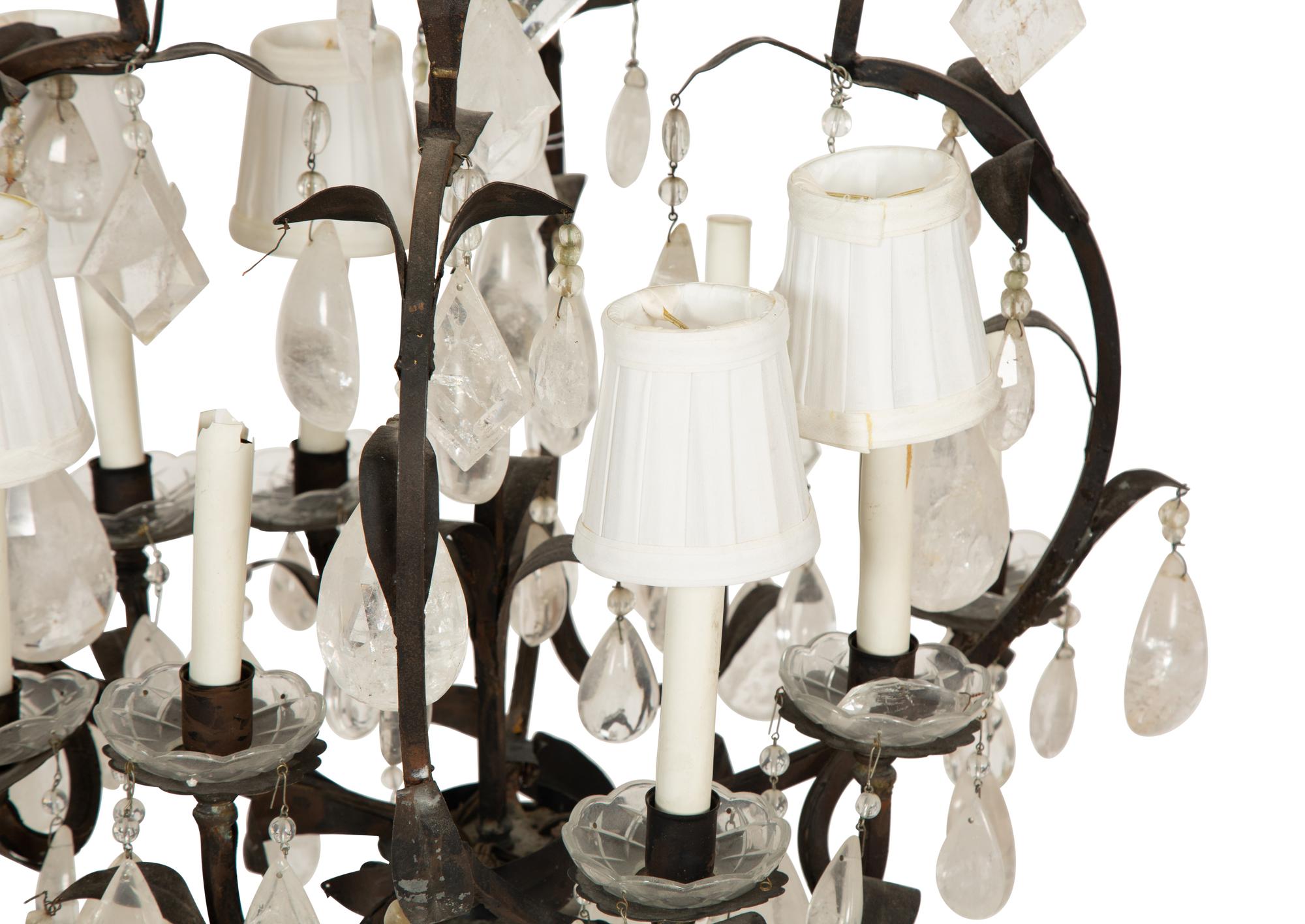 A Wrought Iron and Rock Crystal Eight-Light Chandelier