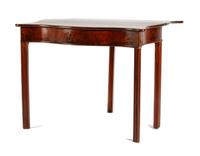 A Georgian Style Mahogany Flip-Top Game Table Height 29 x width 36 x depth 18 inches (closed).