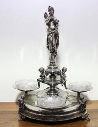 A Victorian Silver-Plate Centerpiece Height of 23 inches. — 19TH CENTURY