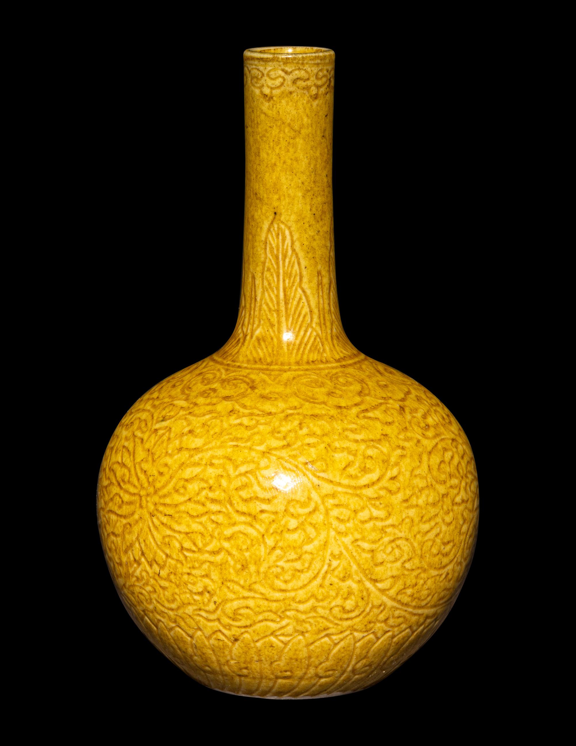 Two Chinese Monochrome Glazed Porcelain Wares, 19th-20th Century 晚清/民國 豇豆紅水呈及黃釉暗刻卷草紋賞瓶