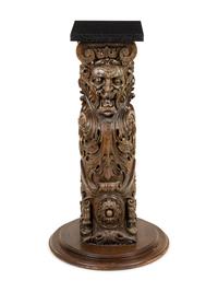 A Continental Carved Oak Pedestal
