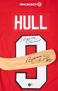 A Bobby Hull Signed Autograph Chicago Blackhawks Jersey and Hockey Stick (Beckett Authentication Services BAS Certfied),