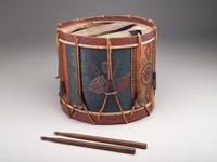 [MILITARIA]. Possibly Mexican War painted drum featuring ornate tack design, with drumsticks.
