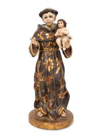 A Continental Polychrome Painted and Parcel Gilt Figure of St. Anthony of Padua