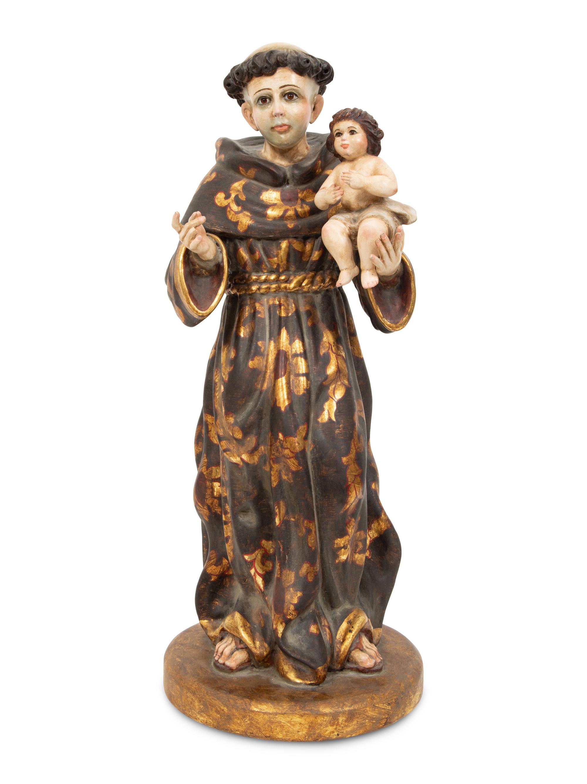 A Continental Polychrome Painted and Parcel Gilt Figure of St. Anthony of Padua