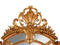 A Régence Style Giltwood and Composition Mirror