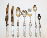 An English Silver-Plate and Mother-of-Pearl Flatware Service Length of dinner knives 9 1/4 inches.