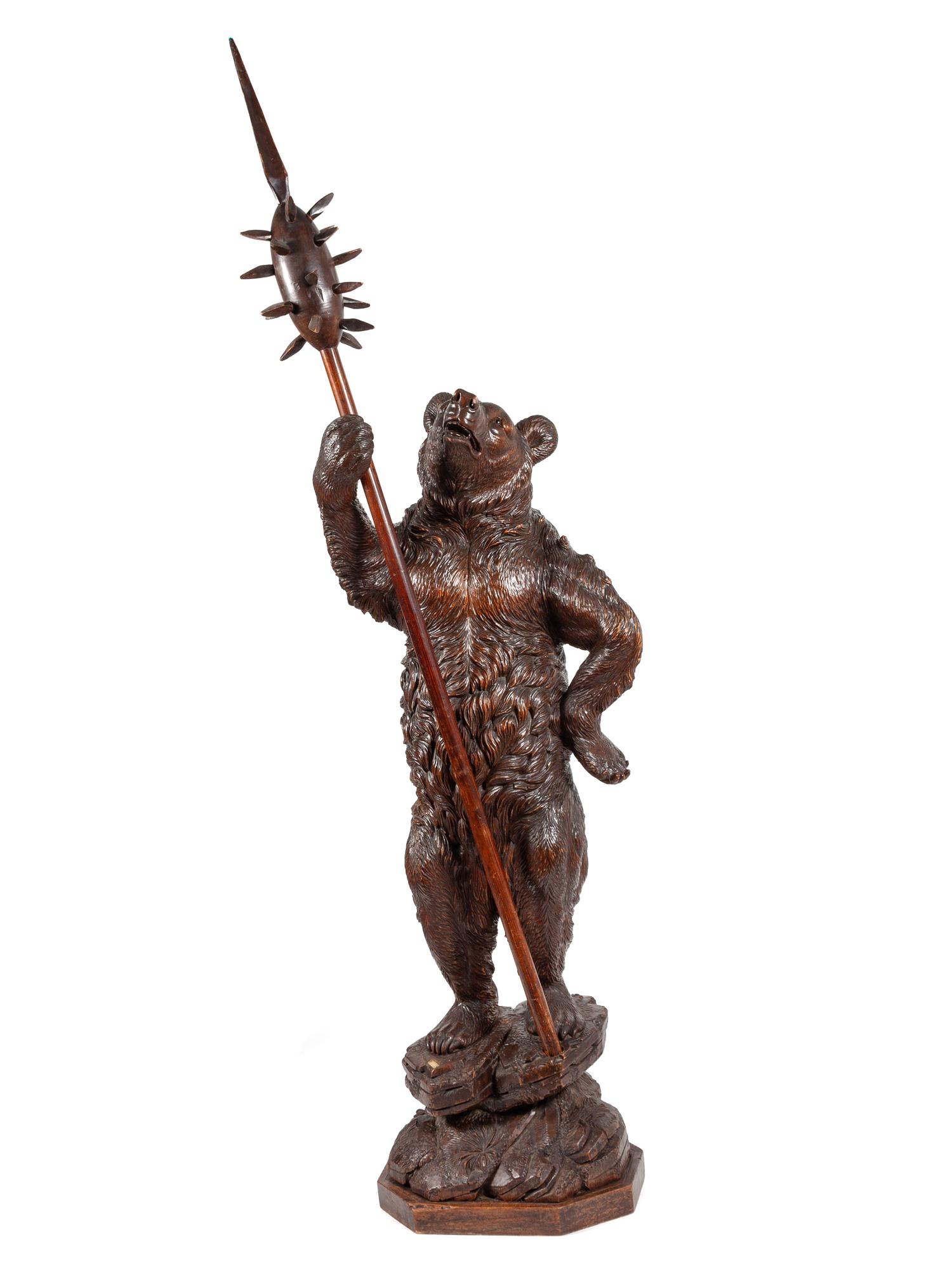 A Black Forest Carved Wood Bear Figure with a Halberd