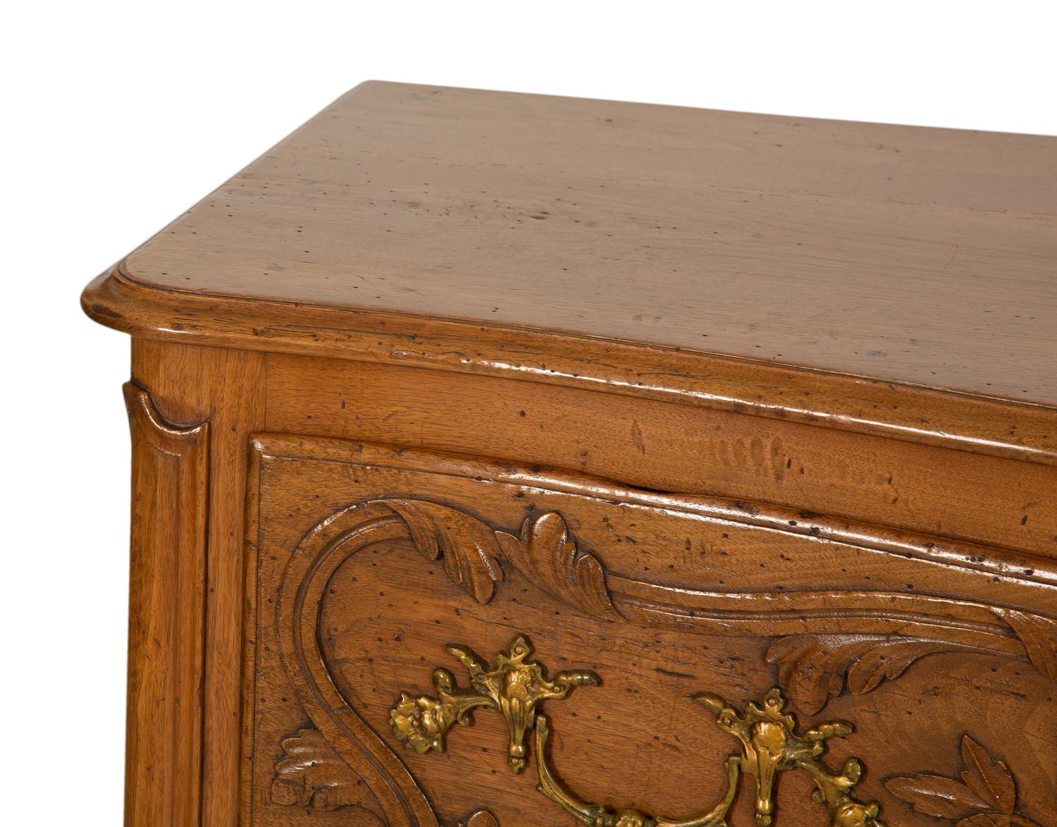 A French Provincial Carved Oak Commode