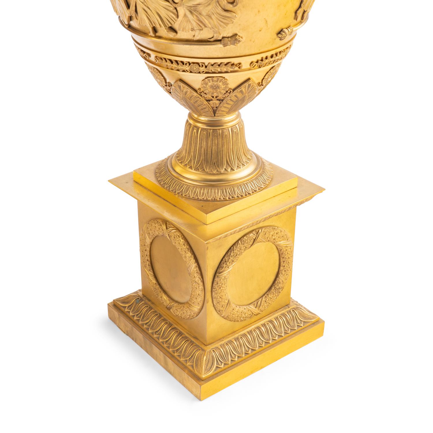 A Pair of French Gilt Bronze Urns