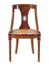 A French Gilt Bronze and Jasperware Mounted Burlwood Dining Suite