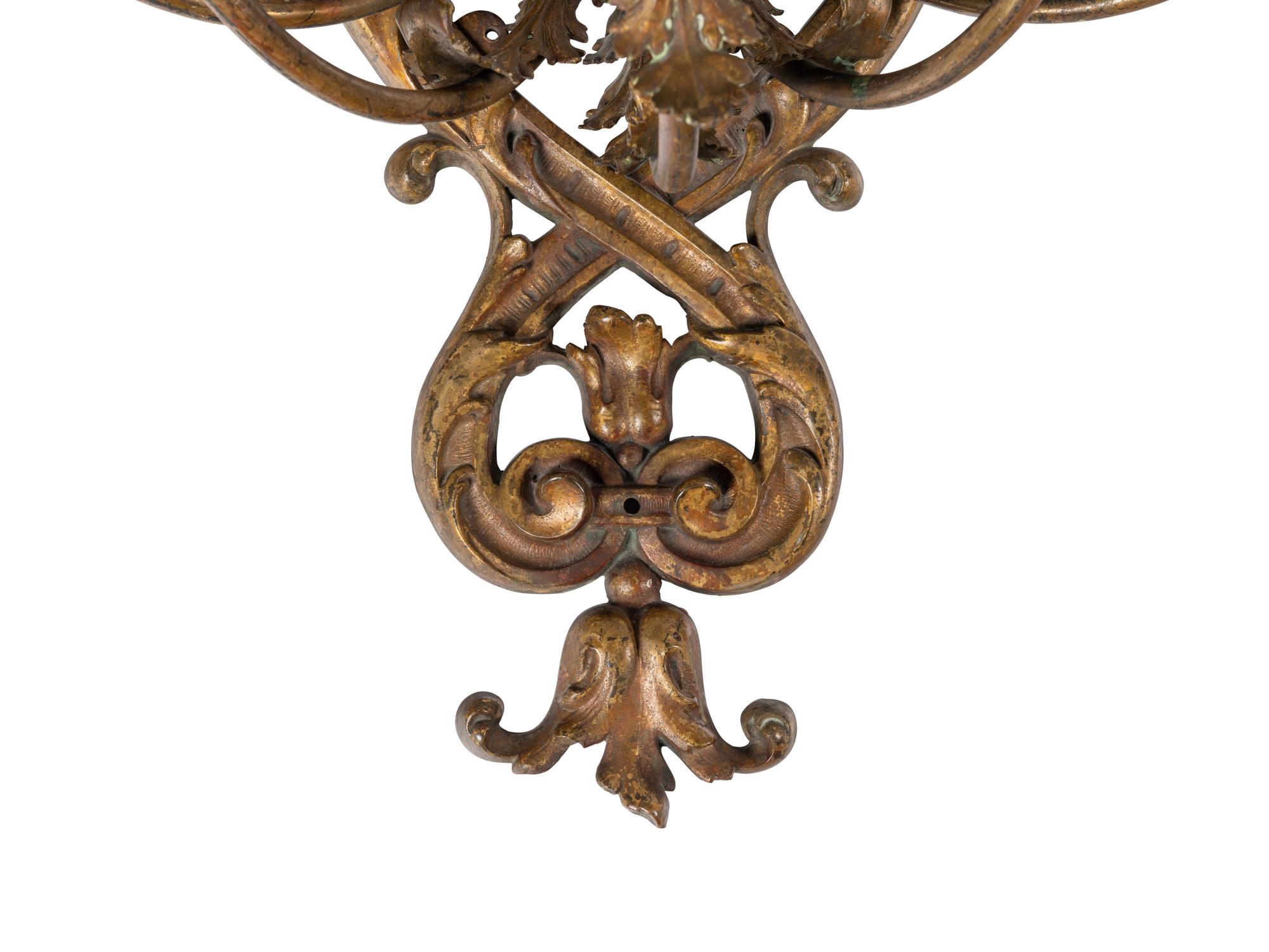 A Pair of Régence Style Gilt Metal Five-Light Sconces