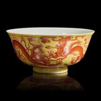A Chinese Iron Red Decorated Yellow-Ground 'Dragons' Bowl, Daoguang Mark — 道光款 黃地礬紅龍紋盌