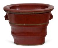 A Lacquered Wood Brass Bound Jardiniere Height 15 1/4 inches. — 20TH CENTURY