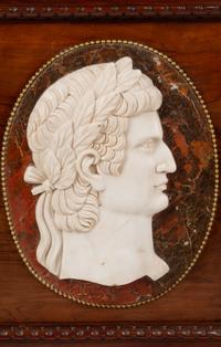 A Pair of Italian Carved Walnut Panels with Marble Profile Plaques