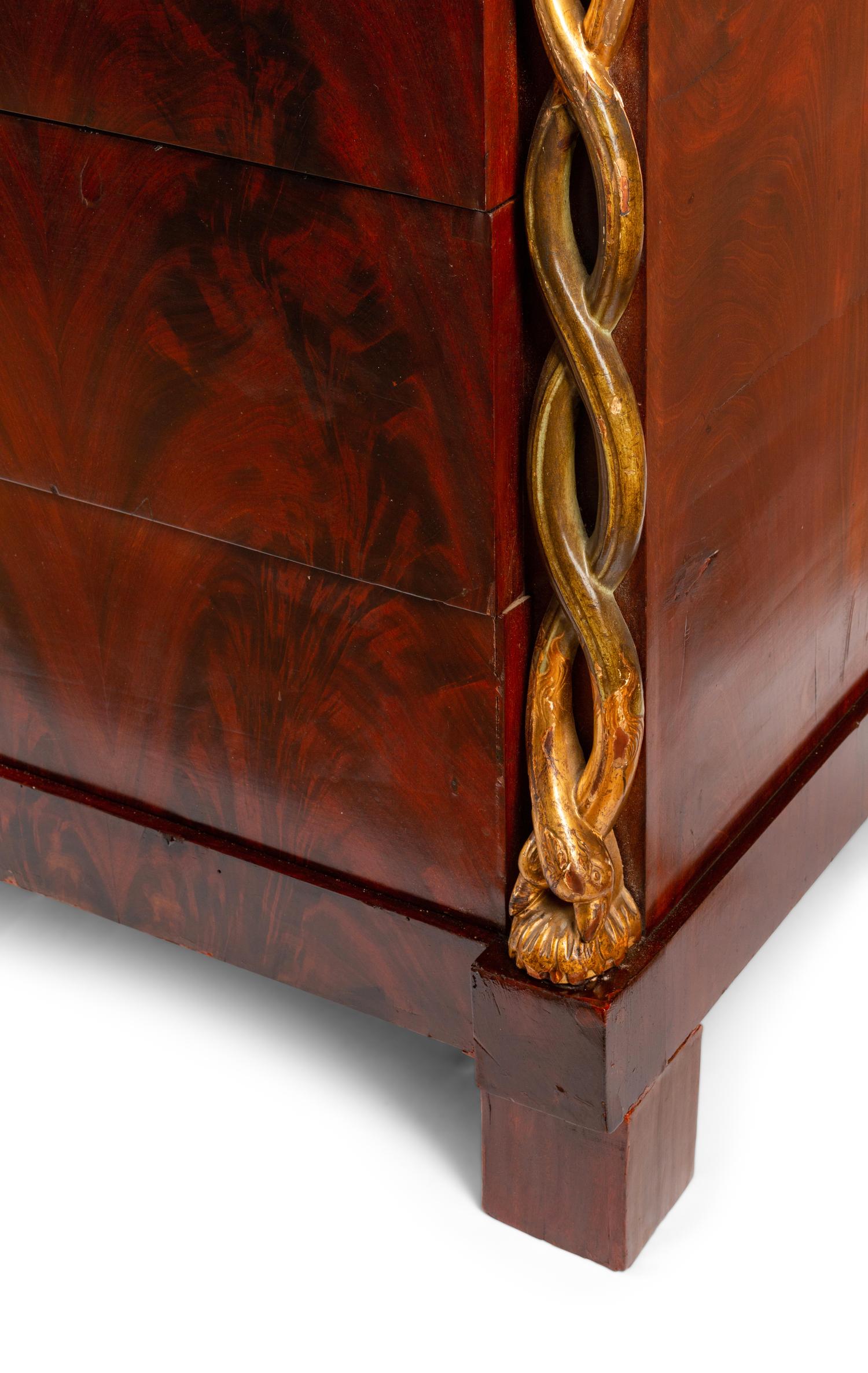 An Italian Parcel Gilt Mahogany Marble-Top Commode