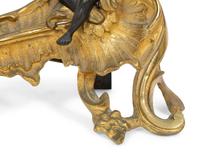 A Louis XV Style Gilt and Patinated Bronze Chenet Mounted as a Lamp