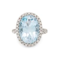 BLUE TOPAZ, DIAMOND, AND WHITE GOLD RING