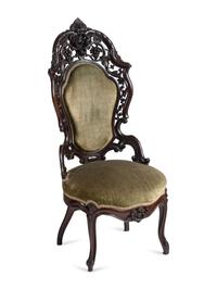 A Renaissance Revival Rosewood Four-Piece Seating Suite