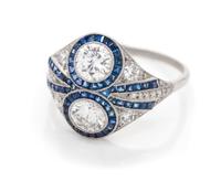 A Platinum, Diamond and Sapphire Ring,