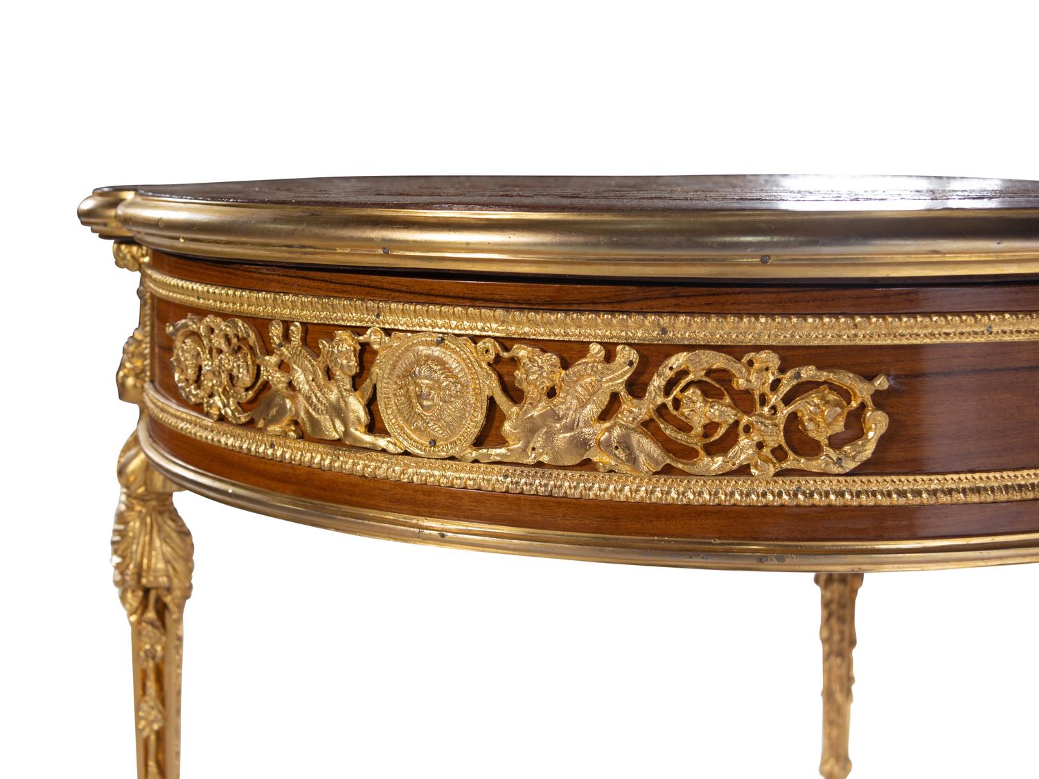 A Louis XVI Style Gilt Metal Mounted Parquetry Table