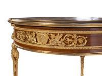 A Louis XVI Style Gilt Metal Mounted Parquetry Table