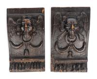 A Pair of Carved Oak Architectural Fragments