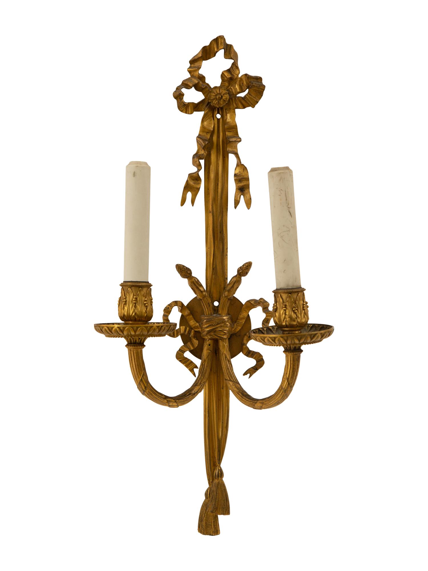 A Pair of Louis XVI Style Gilt Bronze Two-Light Sconces
