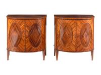 A Pair of George III Goncalo Alves Demilune Cabinets