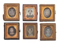 [EARLY PHOTOGRAPHY]. 74 sixteenth plate daguerreotypes of men, women, & children of varying ages.