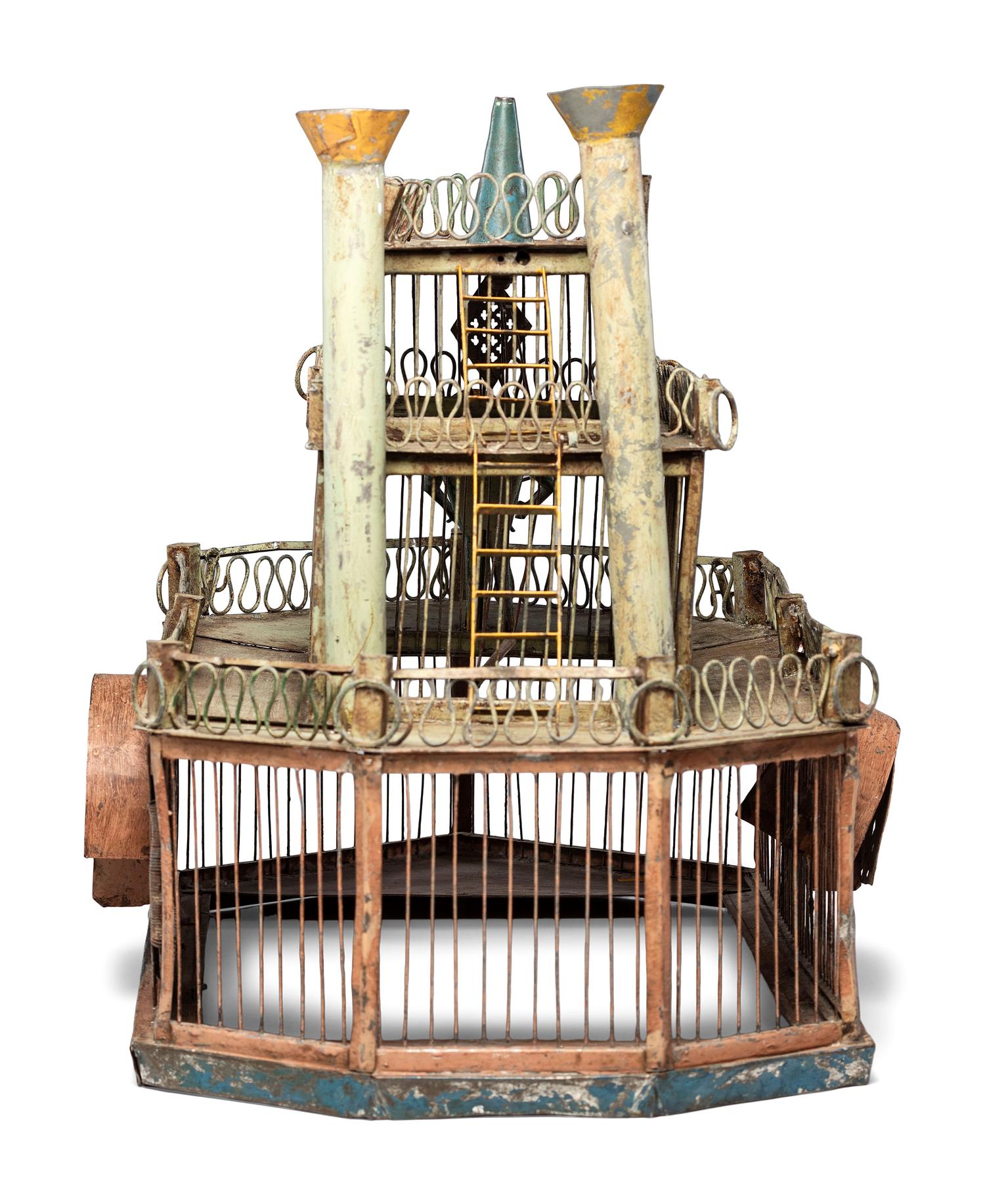 A Folk Art Cut and Painted Metal Paddleboat Form Birdcage