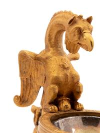 A Continental Gilt Bronze Oil Lamp with a Dragon Handle