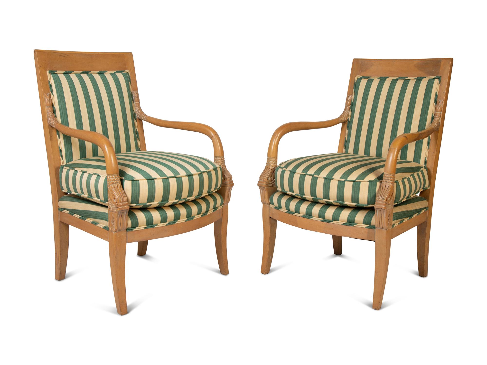 A Set of Twelve Directoire Style Carved Light Wood Dining Chairs — 20TH CENTURY