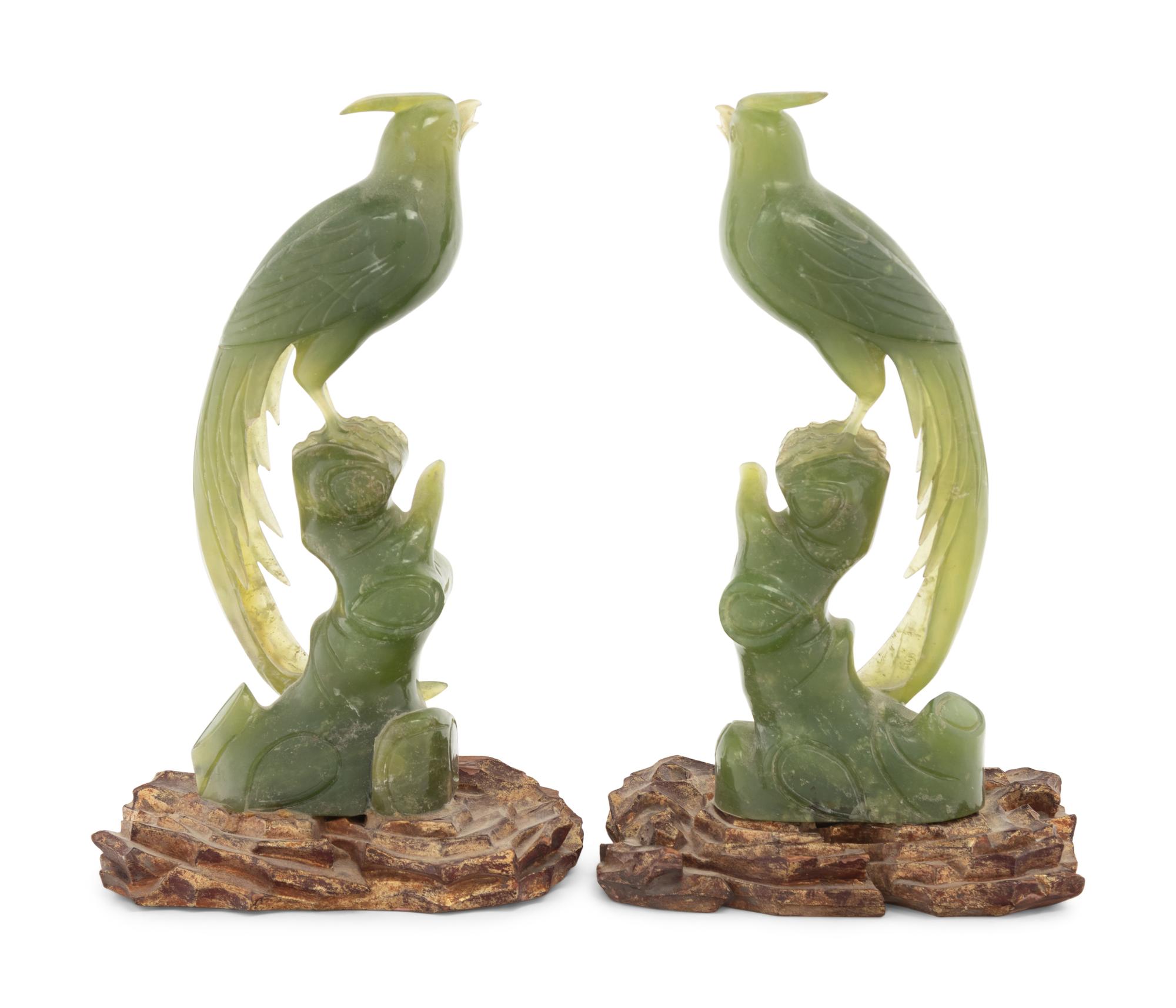A Pair of Carved Serpentine Bird Figures