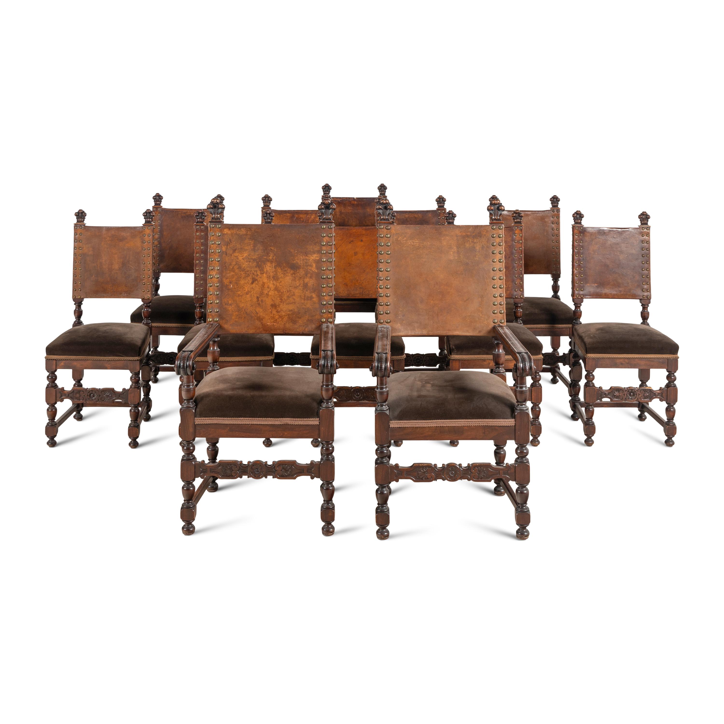 A Set of Twelve Spanish Baroque Style Walnut and Leather Dining Chairs